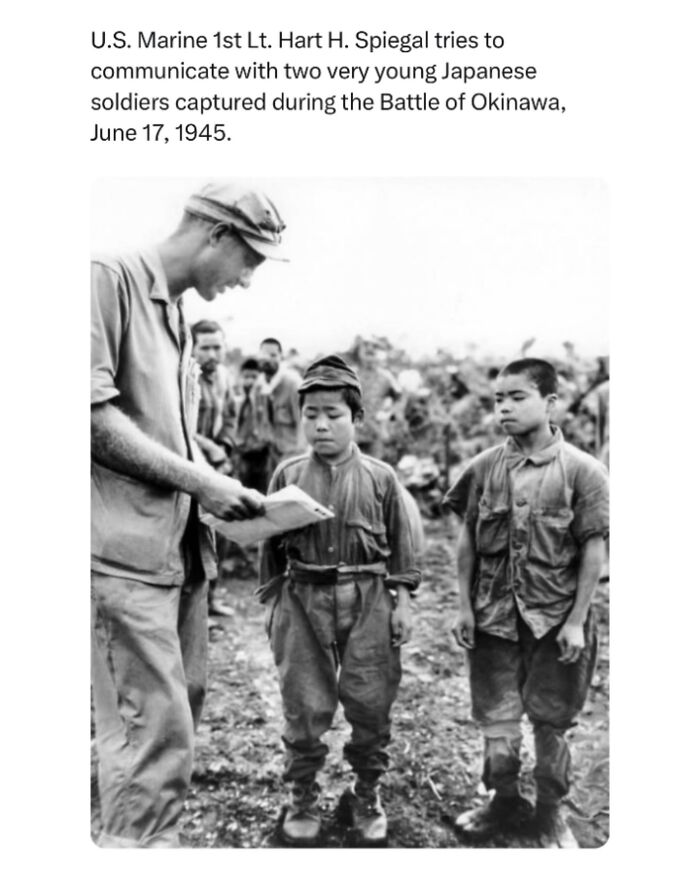 U.S. Marine 1st Lt. Hart H. Spiegal Tries To Communicate With Two Very Young Japanese Soldiers Captured During The Battle Of Okinawa, June 17, 1945. #usarmy #army #usa #japan #interesting #history #facts #didyouknow #learn