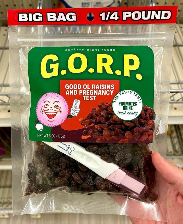Fake product by Obvious Plant featuring raisins and a pregnancy test, humorously labeled G.O.R.P. in a store setting.