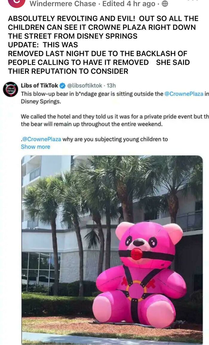 A large pink inflatable bear in provocative gear outside Crowne Plaza, causing backlash and controversy online.
