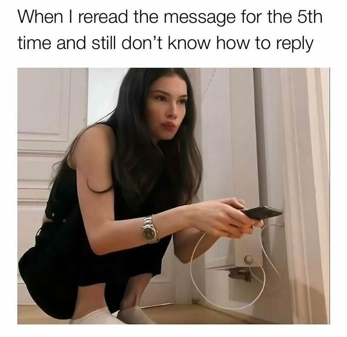 Woman pondering a text reply, holding a phone, looking thoughtful. Funny memes about relatable texting situations.
