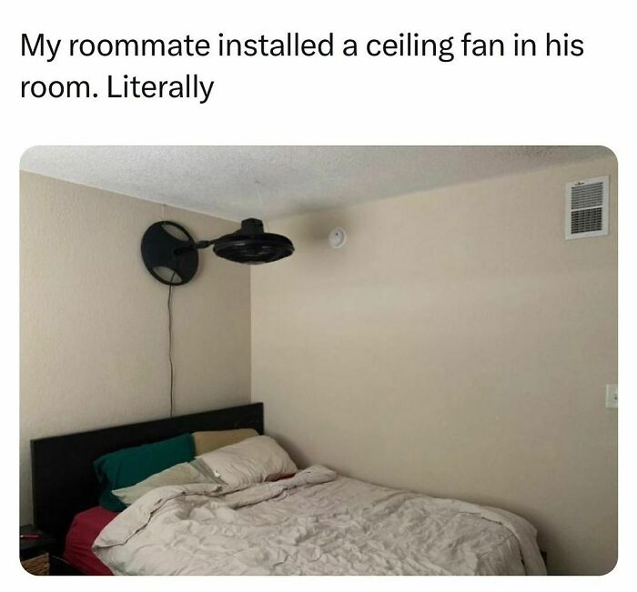 Roommate installs a ceiling fan on the wall above bed in a minimalist bedroom, highlighting students and young adults living interesting lives.