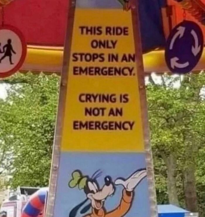 Amusement ride sign stating crying is not an emergency, part of random and cringe photos with unique sense of humor.