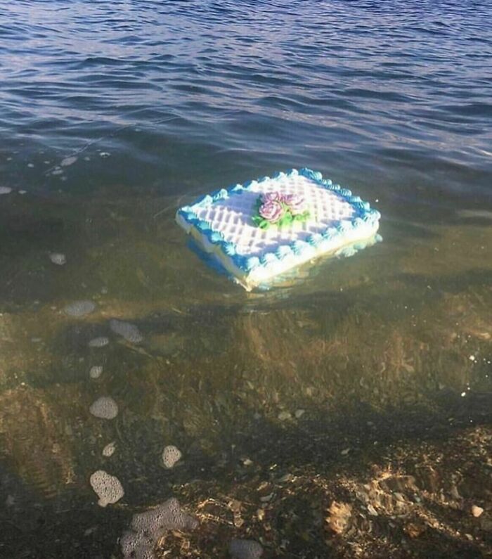 Floating cake on water, showcasing the weirdest Instagram account creativity.