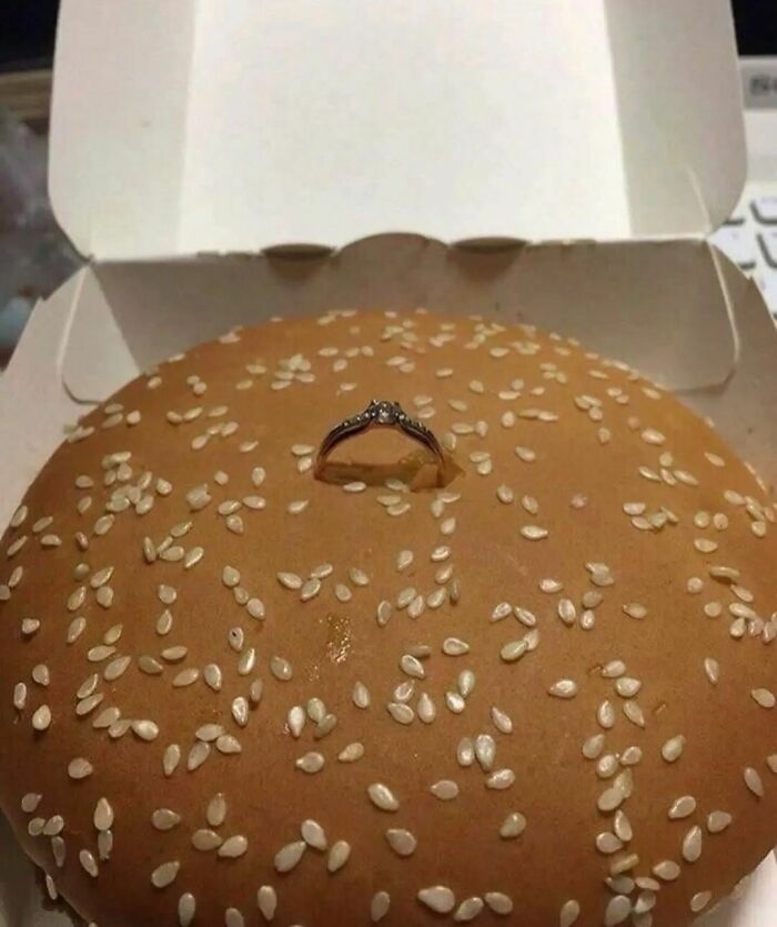 Sesame bun with a ring on it from a quirky Instagram account featuring bizarre images.