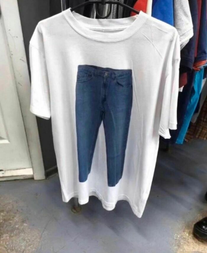 White T-shirt with a photo of blue jeans, highlighting "I Want To Leave Ok" Instagram account's peculiar content.
