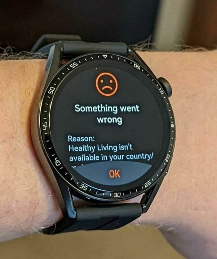 Smartwatch displaying error: "Something went wrong. Reason: Healthy Living isn't available in your country."