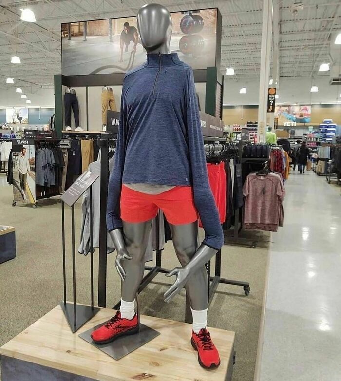 Mannequin with oversized sleeves and red shorts in a store, showcasing a quirky fashion from a weird Instagram account.