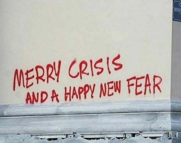 Graffiti text reads "Merry Crisis And A Happy New Fear," showcasing the weirdest Instagram content.