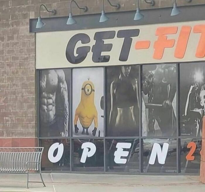 Get-fit gym sign featuring a muscular Minion image, showcasing odd Instagram content.