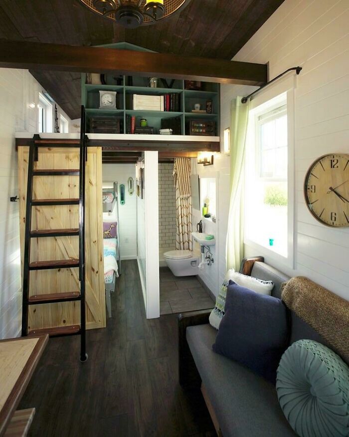 Multi-Purpose Barn Door / Ladder With Library In This 3 Bedroom Thow With Murphy Bunks Under The Loft