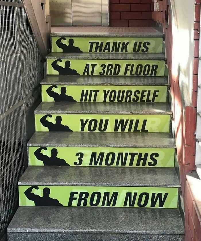 Staircase with awkward fitness motivational message containing confusing and painful phrasing on each step.