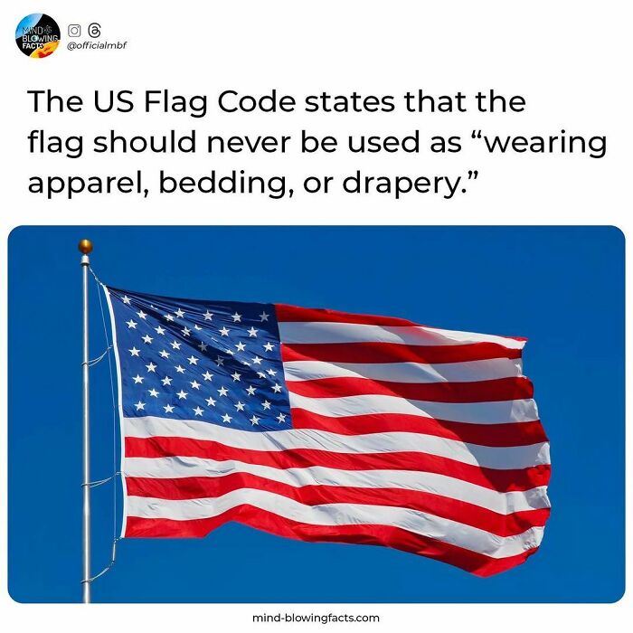 US flag waving against clear sky with text sharing an amazing fact about flag code on a popular Instagram page.