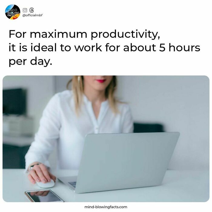 Woman working on a laptop with focus on productivity, illustrating amazing facts shared on this Instagram page.