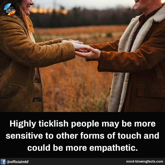 Two people holding hands outdoors, illustrating a mind-blowing fact about sensitivity and empathy.