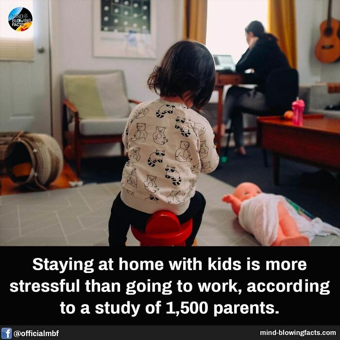Child sitting on a toy at home while an adult works on a laptop, illustrating mind-blowing facts about parenting stress.