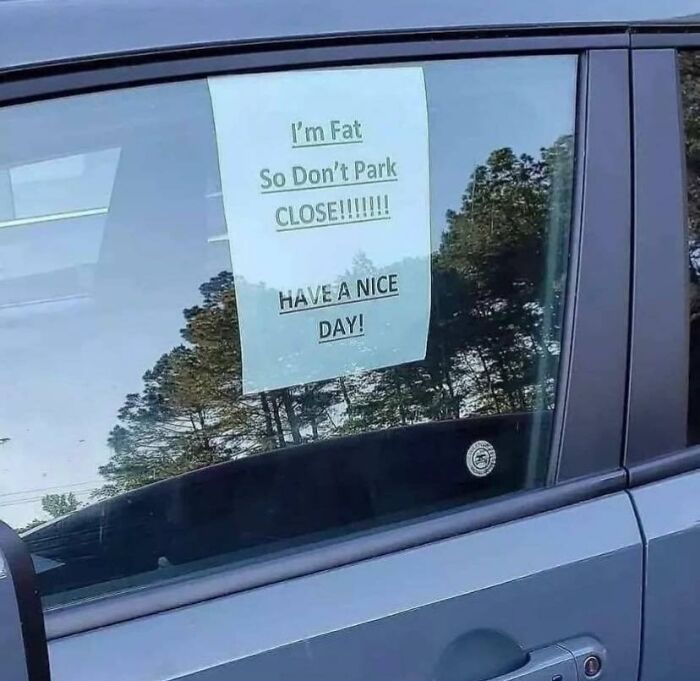 Funny meme on car window: "I'm fat so don't park close. Have a nice day!"