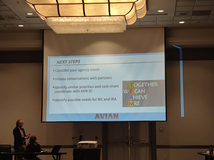 Presentation slide in a conference room showing next steps with a focus on funny and awkward moments when an attempt didn’t go as expected.