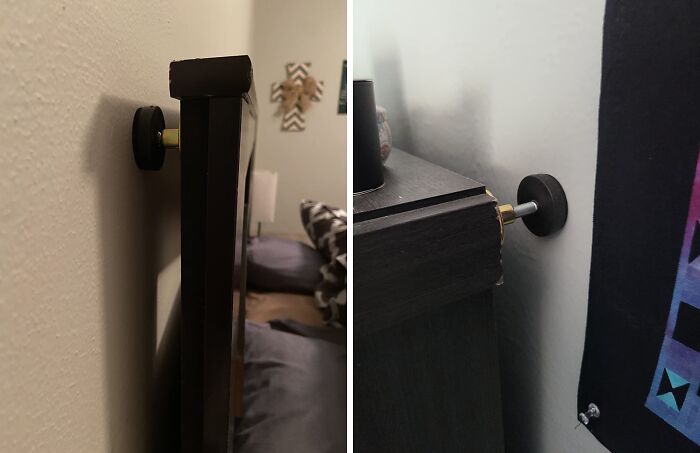 Black furniture wall protectors installed to prevent damage, a genius Amazon find for solving common household problems.