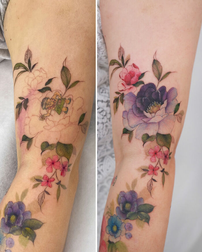 Watercolor-style tattoo designs featuring colorful flowers and leaves on an arm, showcasing artistic flair.