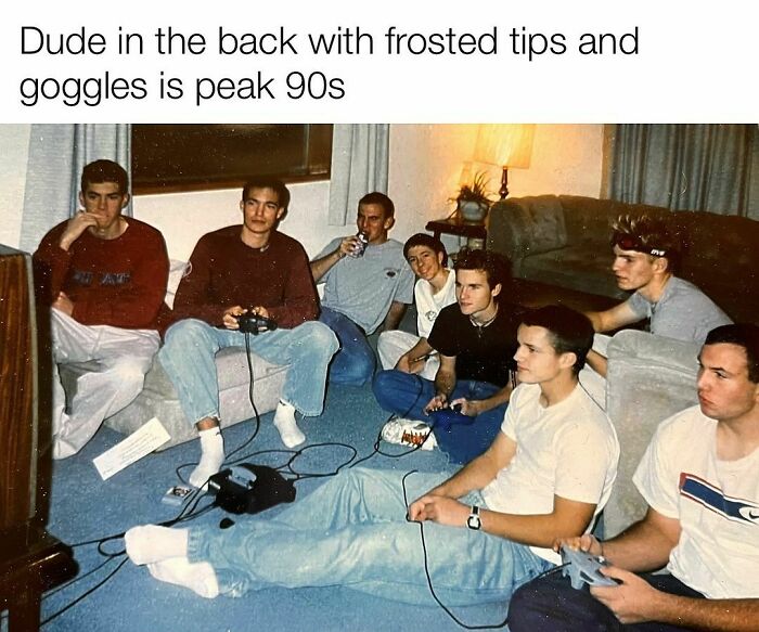 Group of 90s teens playing video games together in a living room, capturing nostalgic vibes of Tamagotchis and VHS tapes era.