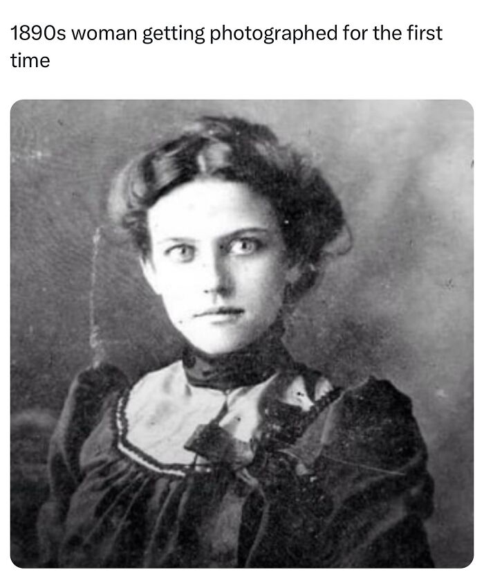 1890s woman in vintage dress captured in historic moment, shared by history facts page with over 1M followers daily.