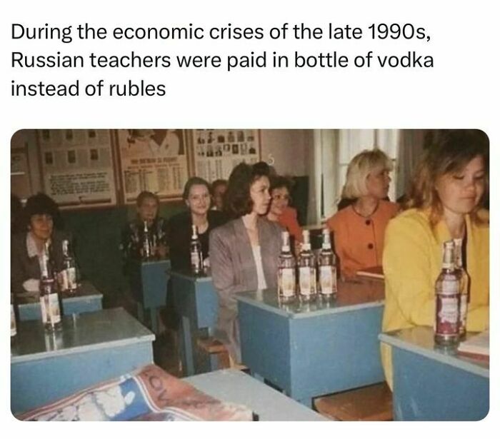 Classroom of Russian teachers in the 1990s with bottles of vodka as payment, a unique history fact shared by millions.