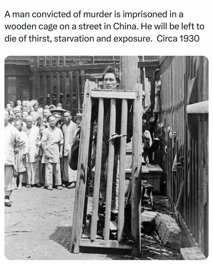 A Man Convicted Of Murder Is Imprisoned In A Wooden Cage On A Street In China. He Will Be Left To Die Of Thirst, Starvation And Exposure. Circa 1930 #china #history #interesting #jail #viral #didyouknow