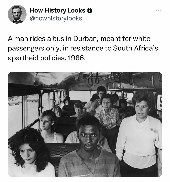 Black man rides bus for white passengers only in Durban, South Africa, resisting apartheid, part of daily history facts followed by 1M people.