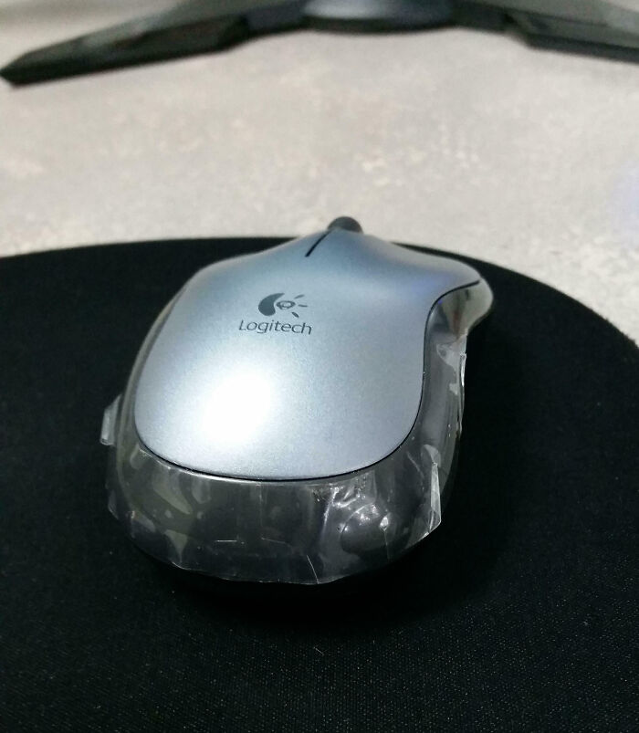 Coworker Has Had This Mouse For Years. How Do People Just Leave The Plastic On