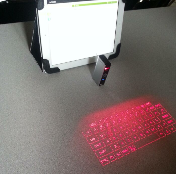 The Kid Beside Me In Class Has A Keyboard Made Of Light