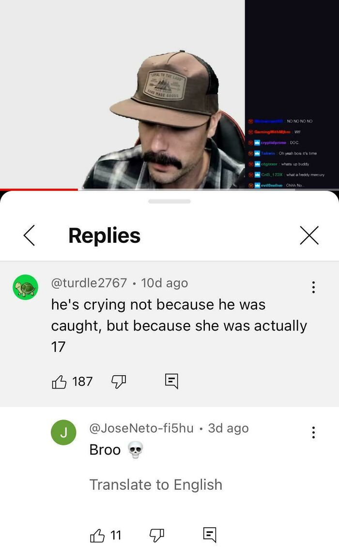 Man wearing a hat reading comments on screen, discussing predictions that came true.