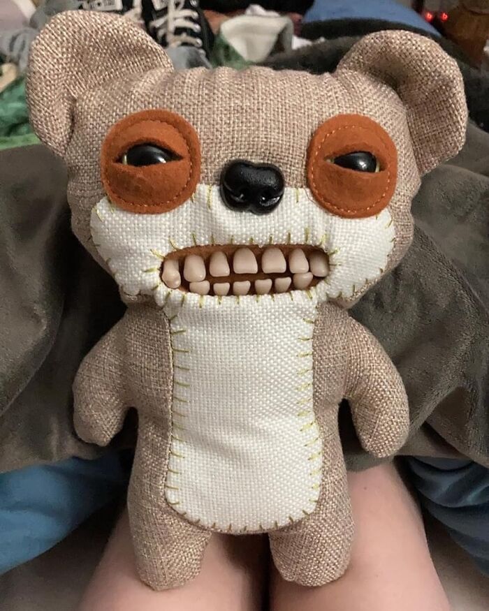 Stuffed animal with sewn fabric and realistic teeth showcasing one of the year's most amazing discoveries spreading joy.