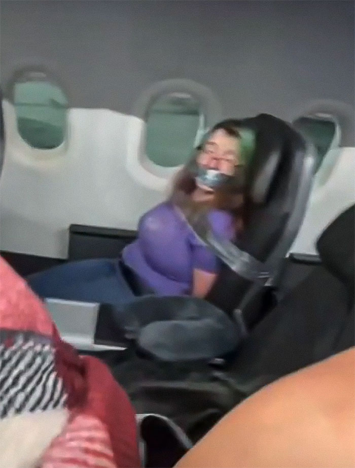 Passenger Who Went Viral After Being Duct-Taped To Airplane Seat Is Sued For Nearly $82k