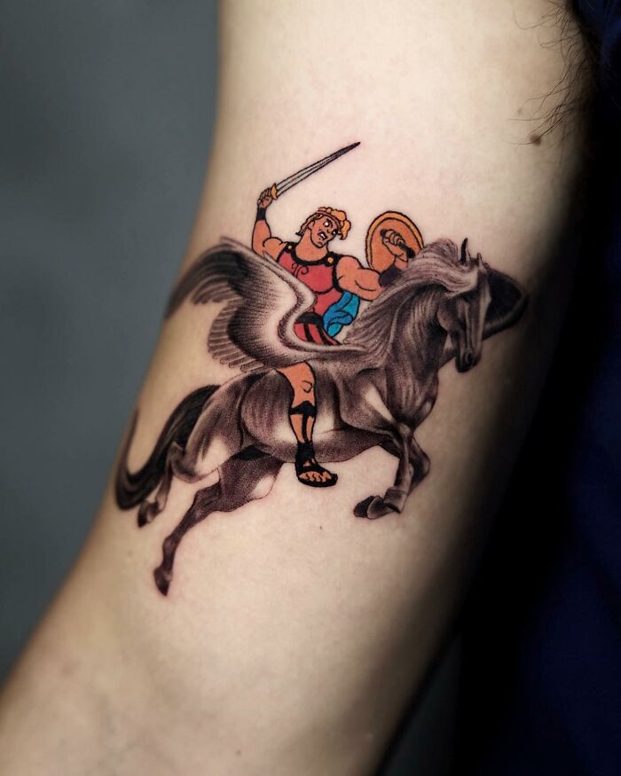 Tattoo of a warrior on a winged horse, blending two artistic styles seamlessly by Mat Rule.