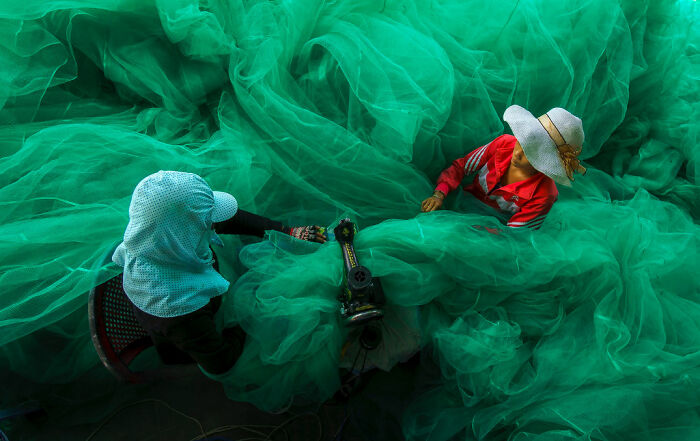 "Sewing The Fishing Net" By Ty Pham