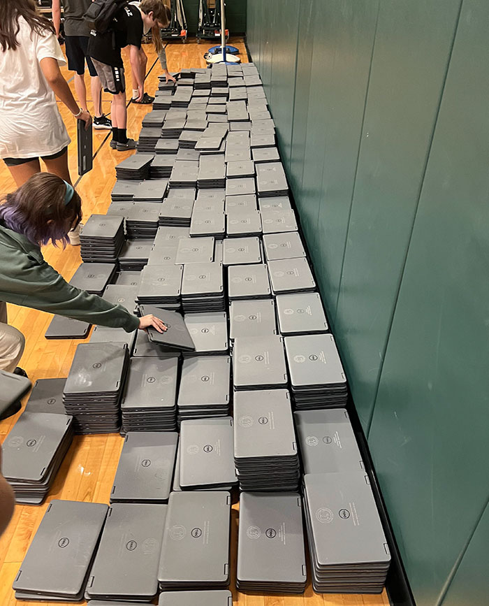 My School Stores Laptops In A Pile On The Floor