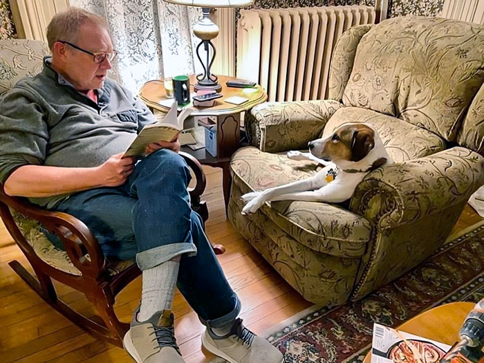 Now That Us Kids Are All Grown Up, My Dad Reads Bedtime Stories To Our Dog
