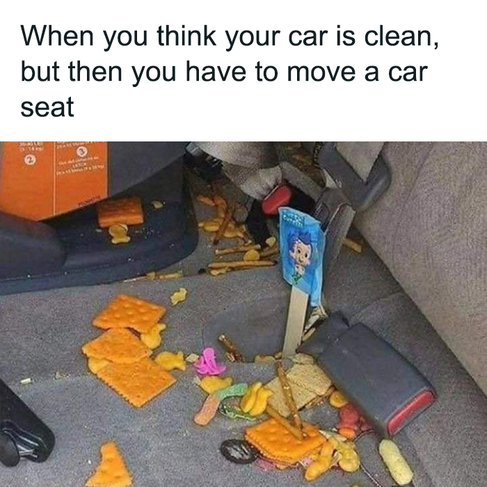 Messy car backseat covered in snacks and toys, illustrating a humorous toddler moment for parents to understand.