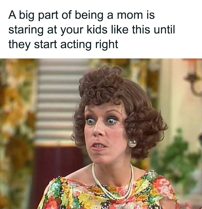 Woman with wide eyes expressing frustration, depicting a relatable toddler meme moment for parents.