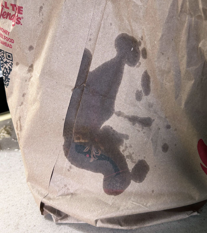Fast Food Bag Stain Looks Like A Guy On The Toilet
