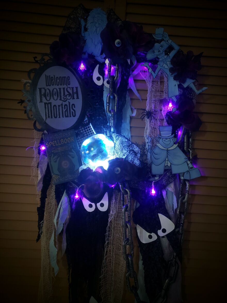 I Made A Haunted Mansion Wreath With Hitchhiking Ghosts, Madam Leota Crystal Ball, A Welcome Foolish Mortals Sign, And Many More (13 Pics) I Made A Haunted Mansion Wreath With Hitchhiking Ghosts, Madam Leota Crystal Ball, A Welcome Foolish Mortals Sign, And Many More (13 Pics)