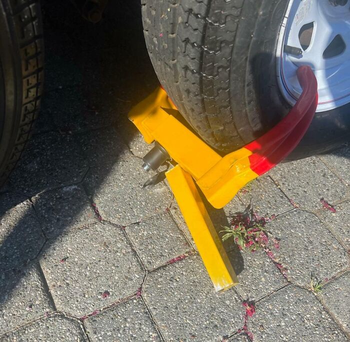 My Wife Tried To Move Our Trailer Without Removing The Wheel Lock First. Now The Locking Mechanism Is Broke And I Can't Figure Out How To Take It Off