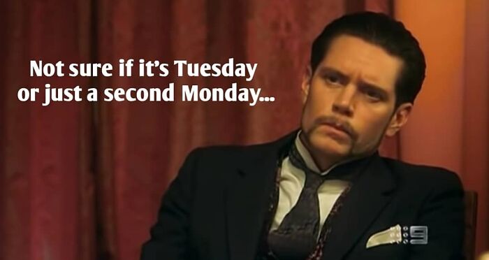 Man in a suit with text "Not sure if it's Tuesday or just a second Monday" for a Happy Tuesday meme.