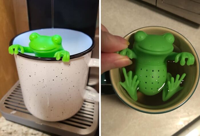 Green frog tea infuser sitting in a mug, showcasing a fun and ridiculous find for tea lovers.