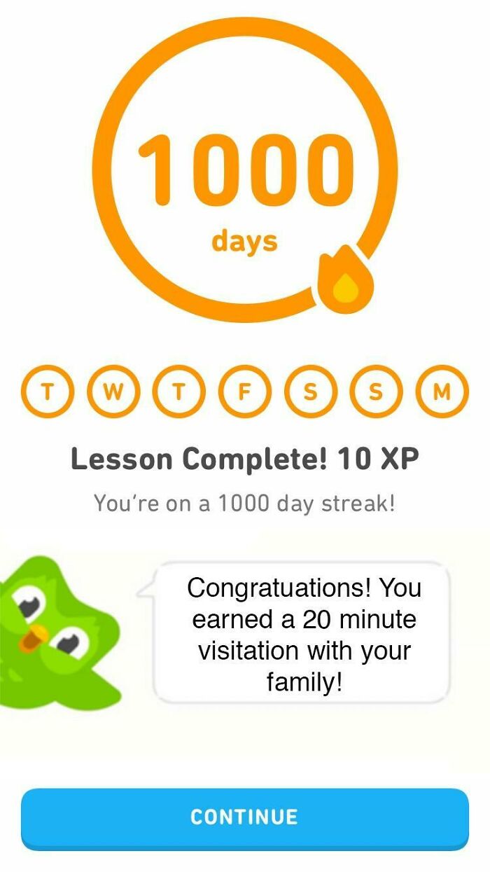 Duolingo meme with 1000-day streak notification and humorous message about family visitation reward.