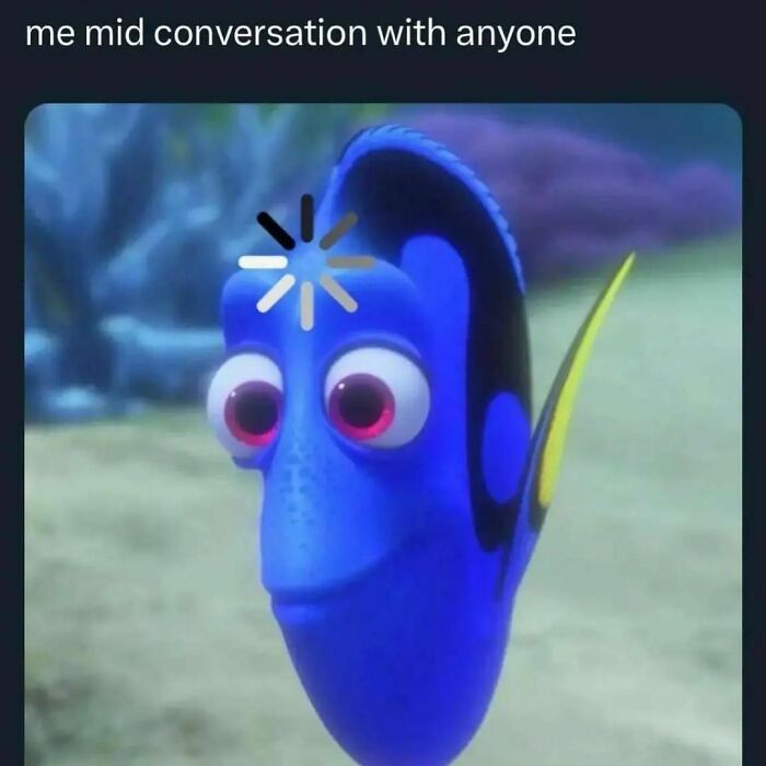 Animated blue fish with a loading symbol, captioned "me mid conversation with anyone," conveying a funny meme moment.