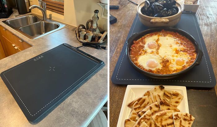 Black silicone kitchen mat on countertop and used as a heat-resistant surface for serving hot dishes and bread.