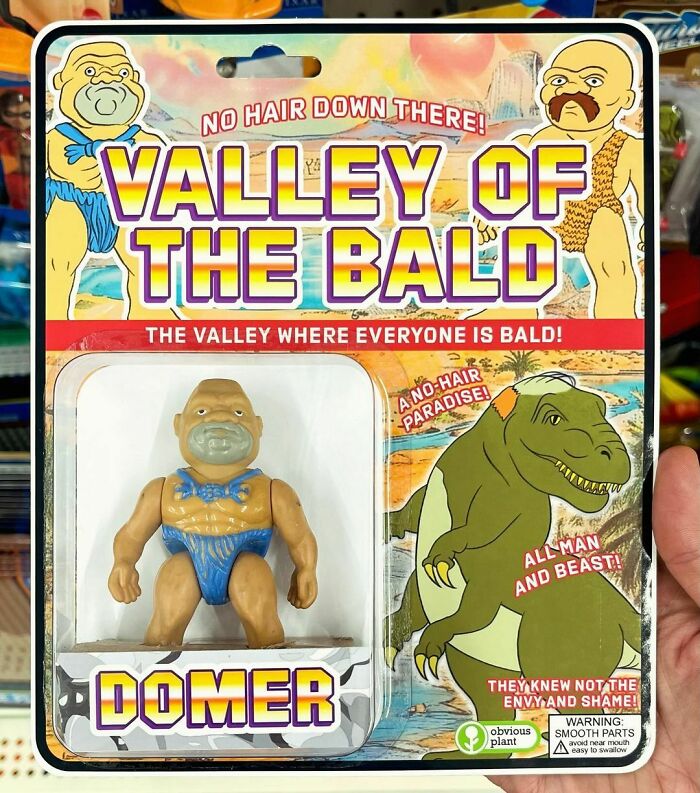 Funny fake product toy, "Valley of the Bald," displayed with colorful packaging in a store by Obvious Plant.