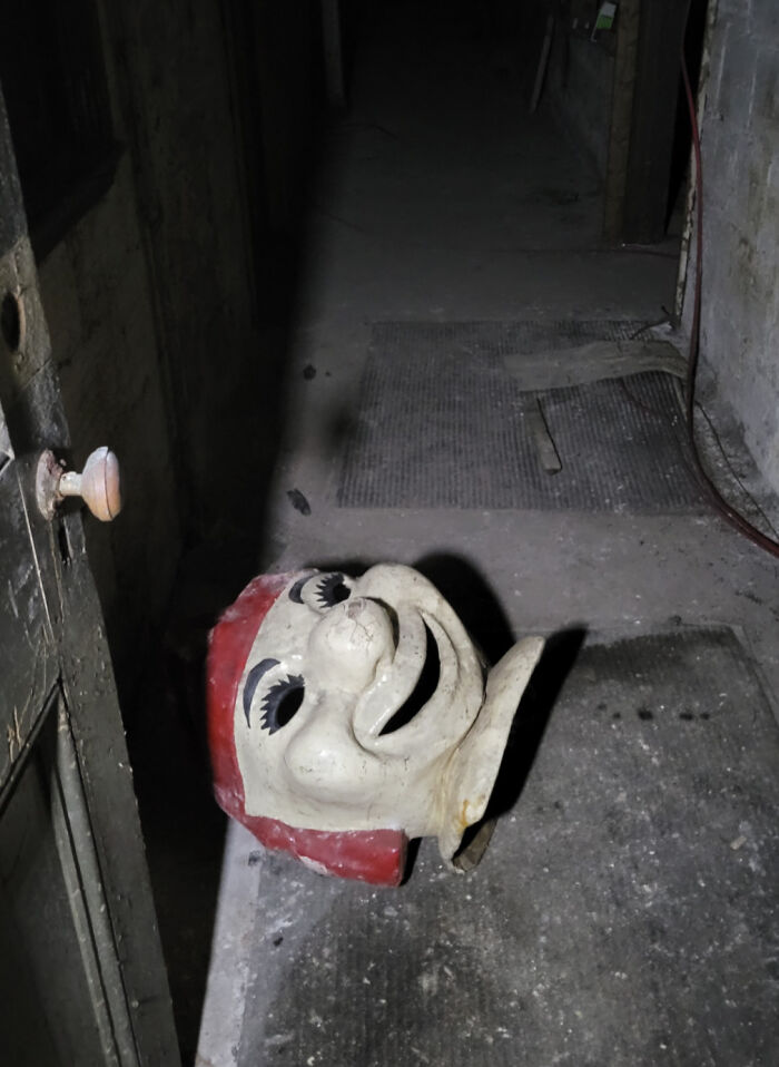 Creepy Mask In A Basement