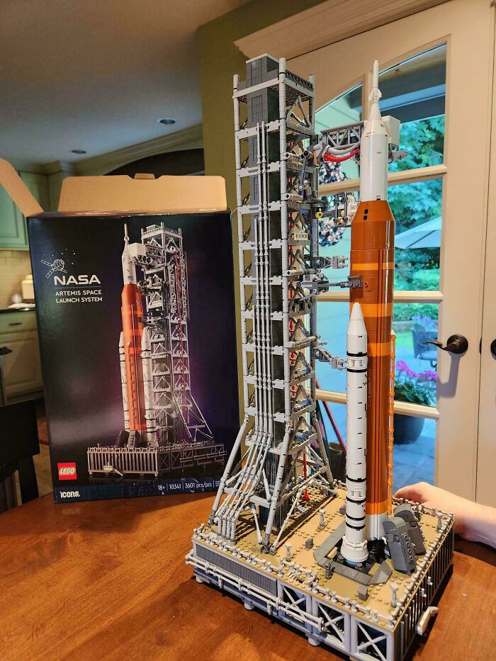 LEGO NASA Artemis launch system model on a table, with a box in the background.